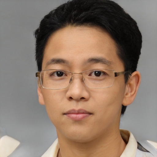 Neutral asian adult male with short  black hair and brown eyes