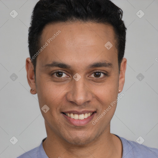 Joyful latino young-adult male with short  brown hair and brown eyes