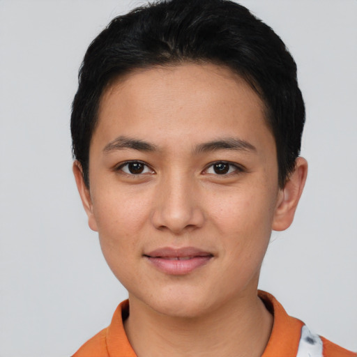 Joyful asian young-adult female with short  brown hair and brown eyes