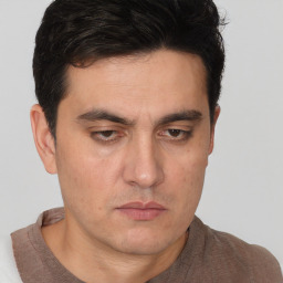 Neutral white adult male with short  brown hair and brown eyes