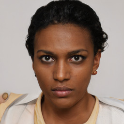 Neutral black young-adult female with short  black hair and brown eyes