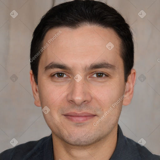 Joyful white adult male with short  brown hair and brown eyes