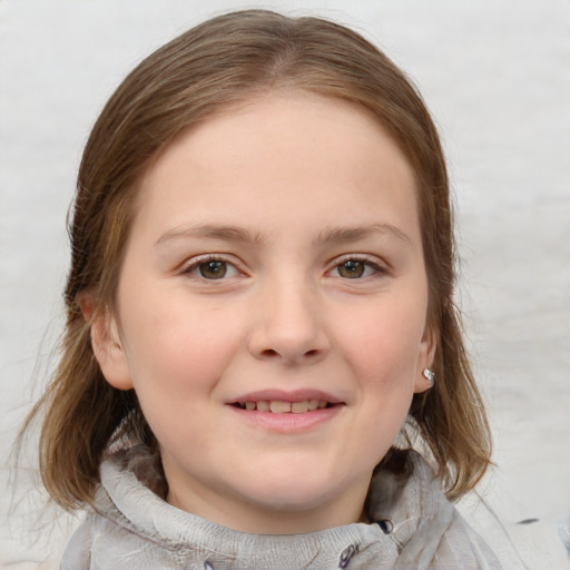 Joyful white child female with medium  brown hair and grey eyes