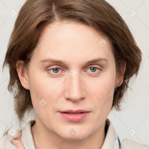 Joyful white young-adult female with medium  brown hair and blue eyes