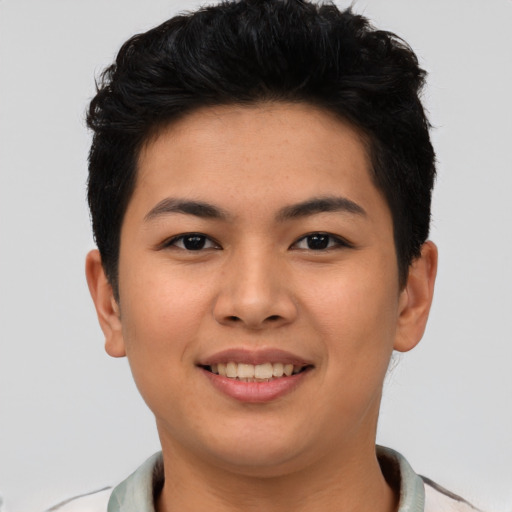 Joyful asian young-adult female with short  black hair and brown eyes