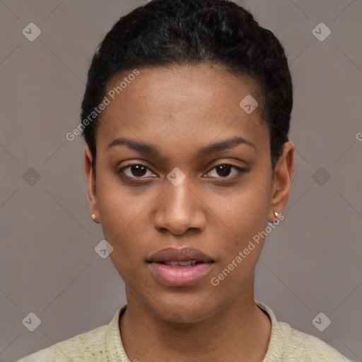 Joyful black young-adult female with short  black hair and brown eyes