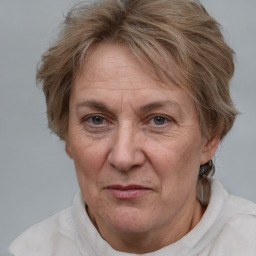 Joyful white middle-aged female with short  brown hair and brown eyes