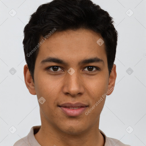 Joyful latino young-adult male with short  brown hair and brown eyes