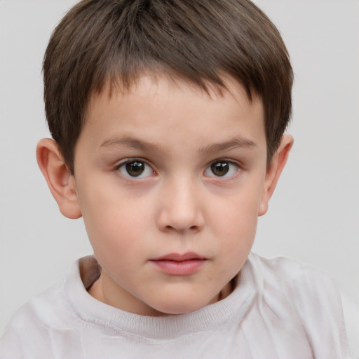 Neutral white child male with short  brown hair and brown eyes