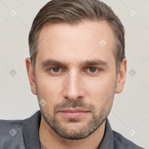 Neutral white young-adult male with short  brown hair and brown eyes