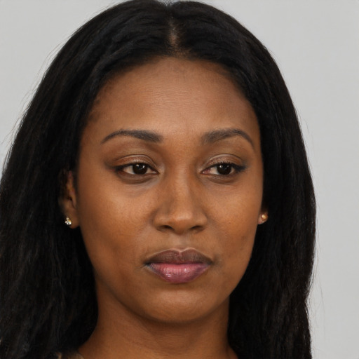 Joyful asian young-adult female with long  black hair and brown eyes