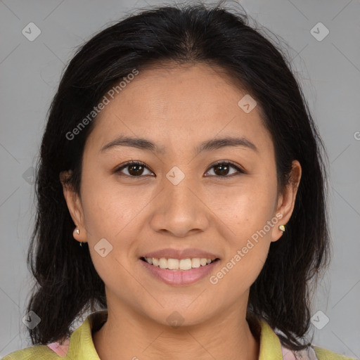 Joyful asian young-adult female with medium  brown hair and brown eyes