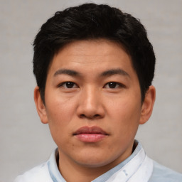 Neutral asian young-adult male with short  brown hair and brown eyes