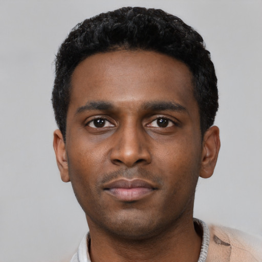 Neutral black young-adult male with short  black hair and brown eyes