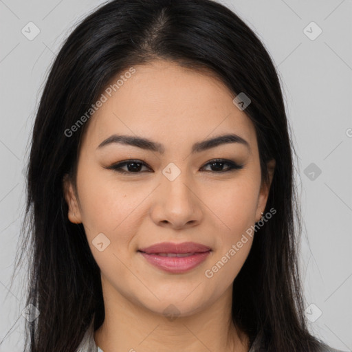 Joyful latino young-adult female with long  brown hair and brown eyes