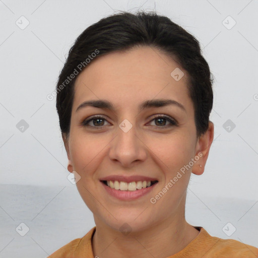 Joyful white young-adult female with short  brown hair and brown eyes