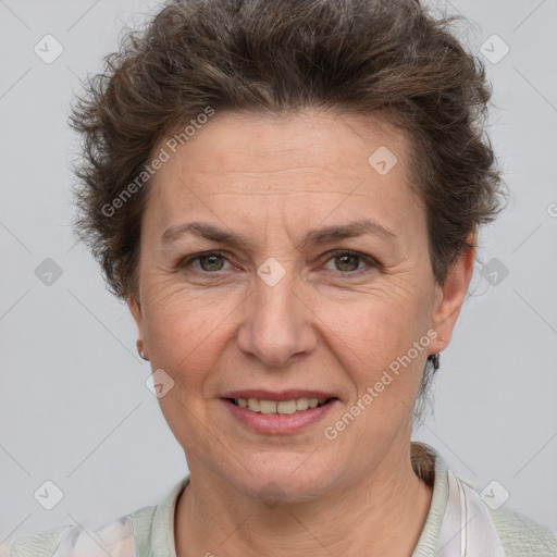 Joyful white adult female with short  brown hair and brown eyes