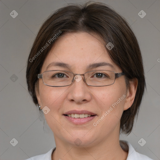 Joyful white adult female with medium  brown hair and brown eyes