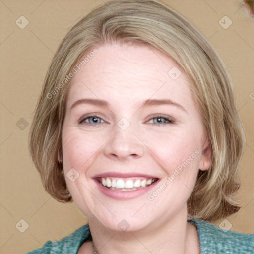 Joyful white young-adult female with medium  brown hair and blue eyes