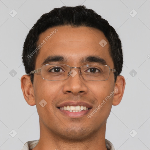 Joyful latino young-adult male with short  black hair and brown eyes