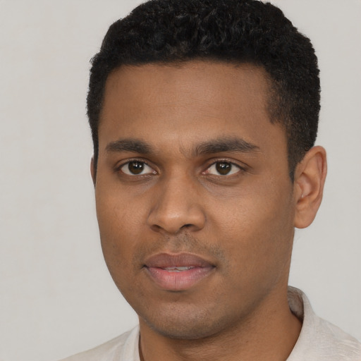 Neutral black young-adult male with short  black hair and brown eyes