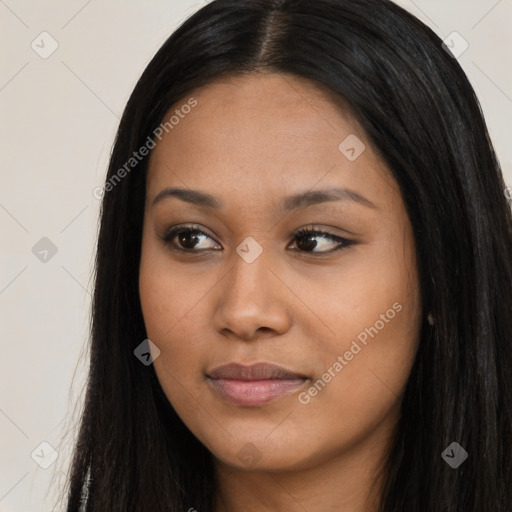 Joyful asian young-adult female with long  brown hair and brown eyes