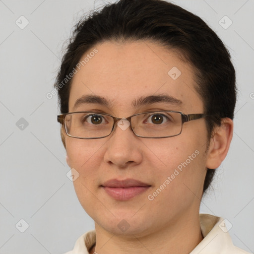 Joyful white adult female with short  brown hair and brown eyes