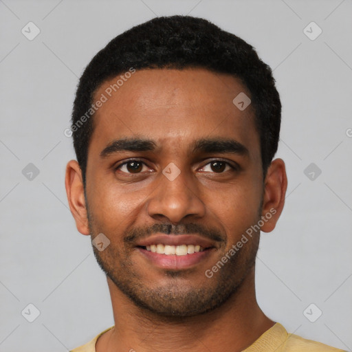 Joyful black young-adult male with short  black hair and brown eyes