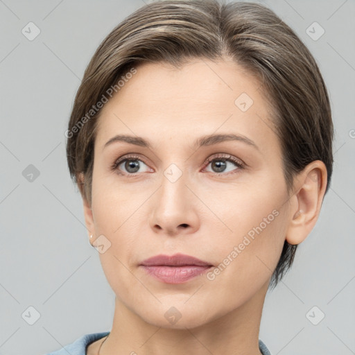 Neutral white young-adult female with short  brown hair and grey eyes