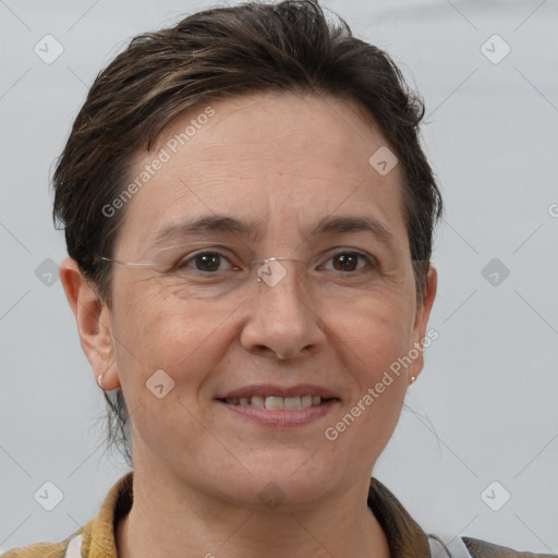 Joyful white adult female with short  brown hair and brown eyes