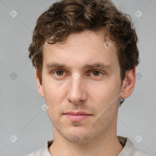 Neutral white young-adult male with short  brown hair and grey eyes