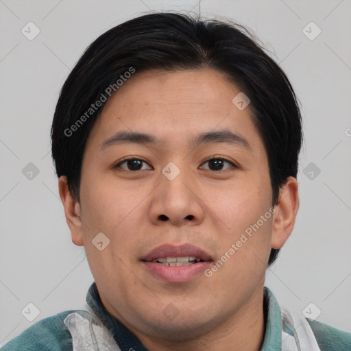 Joyful asian young-adult male with short  black hair and brown eyes