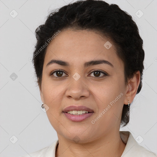 Joyful latino young-adult female with short  brown hair and brown eyes