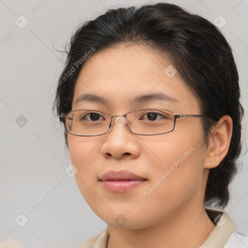 Joyful asian young-adult female with medium  brown hair and brown eyes