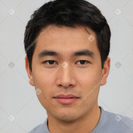 Neutral asian young-adult male with short  black hair and brown eyes