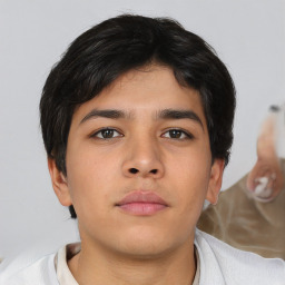 Neutral asian young-adult male with short  brown hair and brown eyes