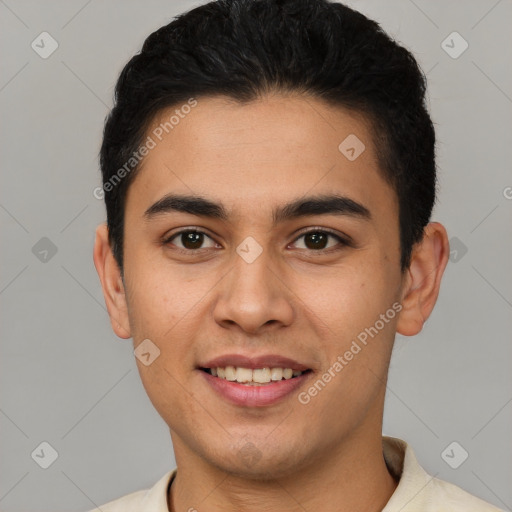 Joyful latino young-adult male with short  black hair and brown eyes