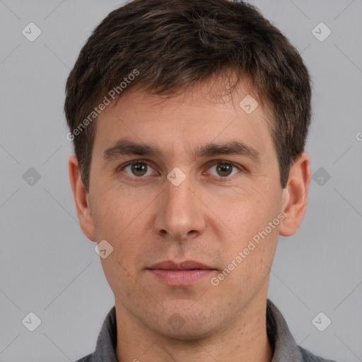 Neutral white young-adult male with short  brown hair and brown eyes