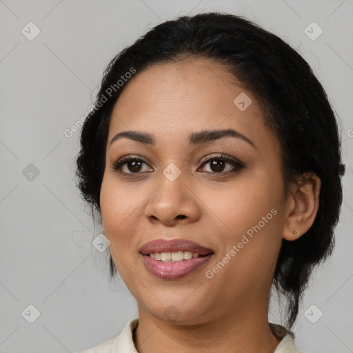 Joyful latino young-adult female with medium  black hair and brown eyes