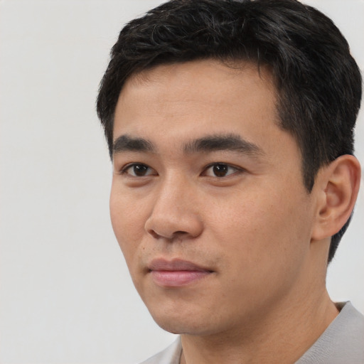 Neutral asian young-adult male with short  black hair and brown eyes