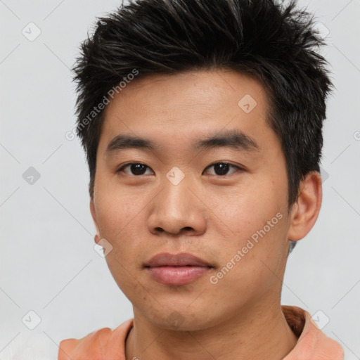 Neutral asian young-adult male with short  brown hair and brown eyes