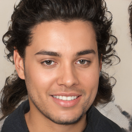 Joyful white young-adult male with medium  brown hair and brown eyes