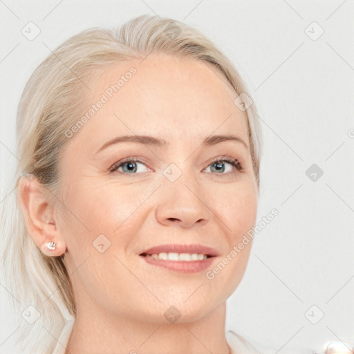 Joyful white young-adult female with medium  brown hair and blue eyes