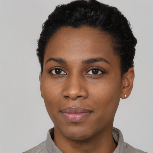 Neutral black young-adult female with short  black hair and brown eyes