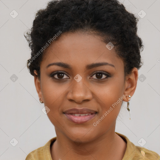 Joyful black young-adult female with short  brown hair and brown eyes