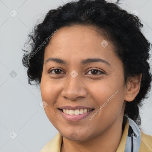 Joyful latino young-adult female with short  brown hair and brown eyes