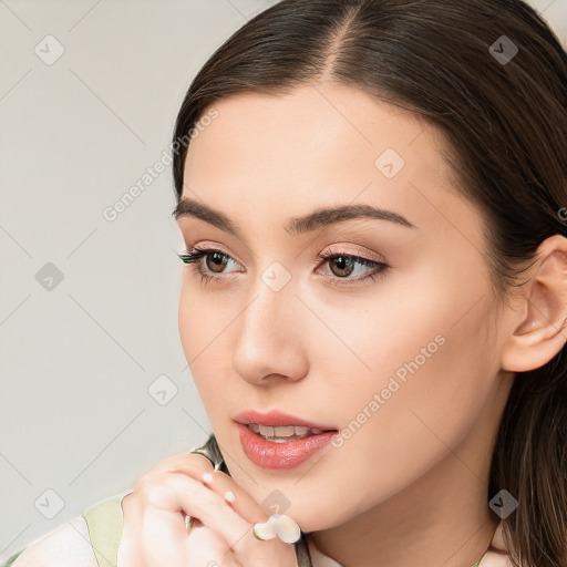 Neutral white young-adult female with long  brown hair and brown eyes