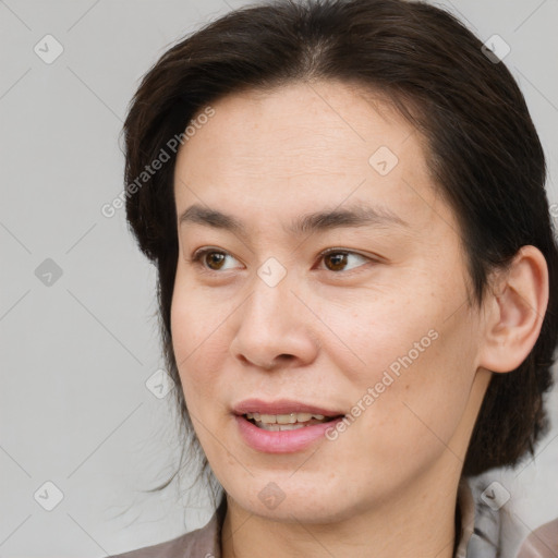 Joyful white young-adult female with medium  brown hair and brown eyes