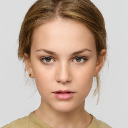 Neutral white young-adult female with medium  brown hair and grey eyes