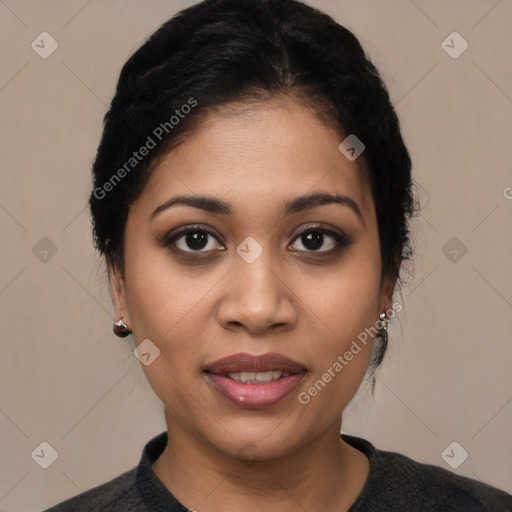 Joyful latino young-adult female with short  black hair and brown eyes